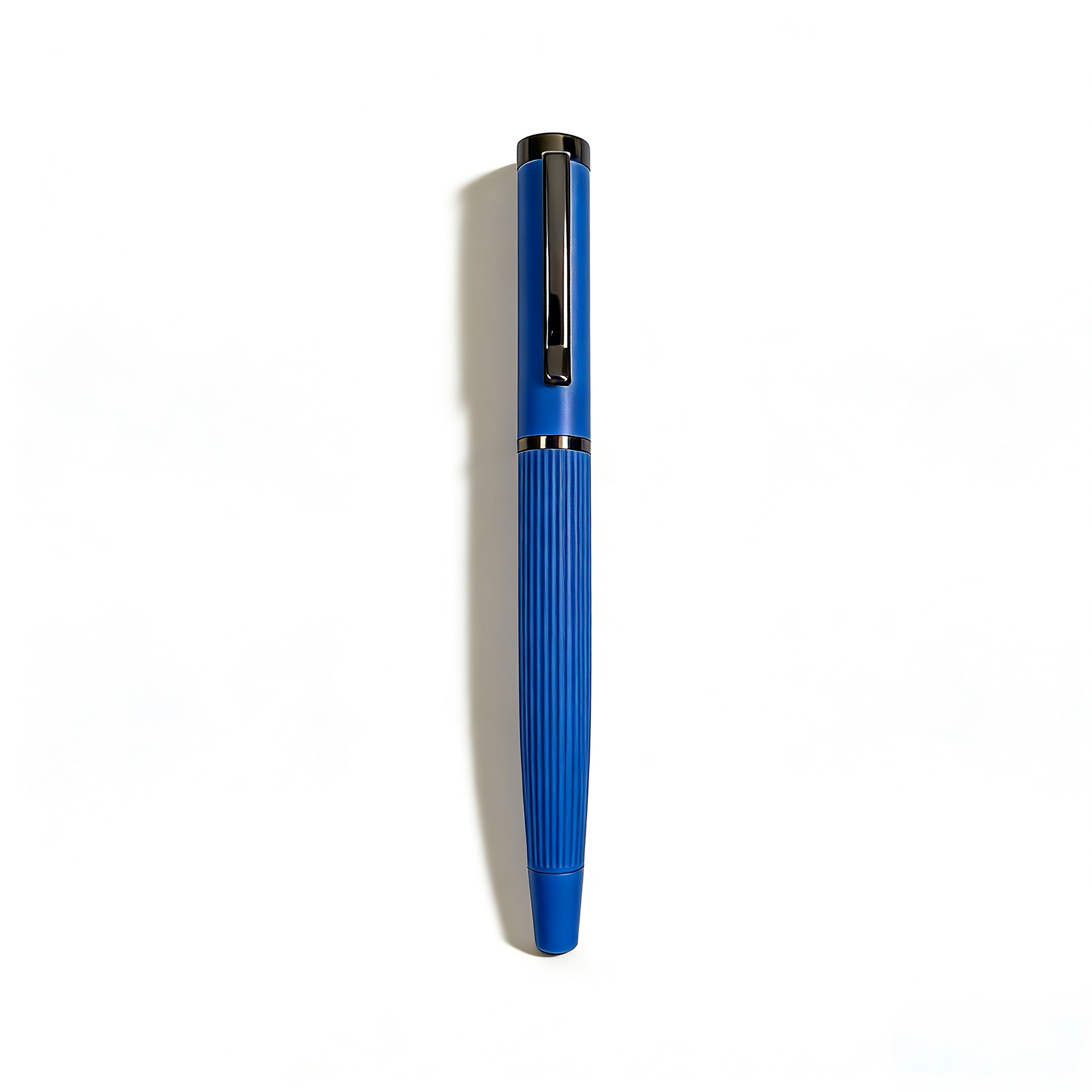 blue pen with grey chrome clip on a white background